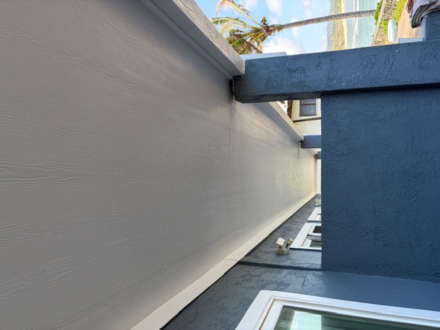 Lanai ceiling and stucco column finished against an open ocean view